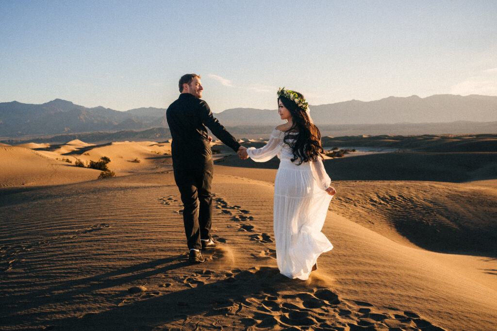 An enchanting sunset elopement amidst the sand dunes of Death Valley National Park.