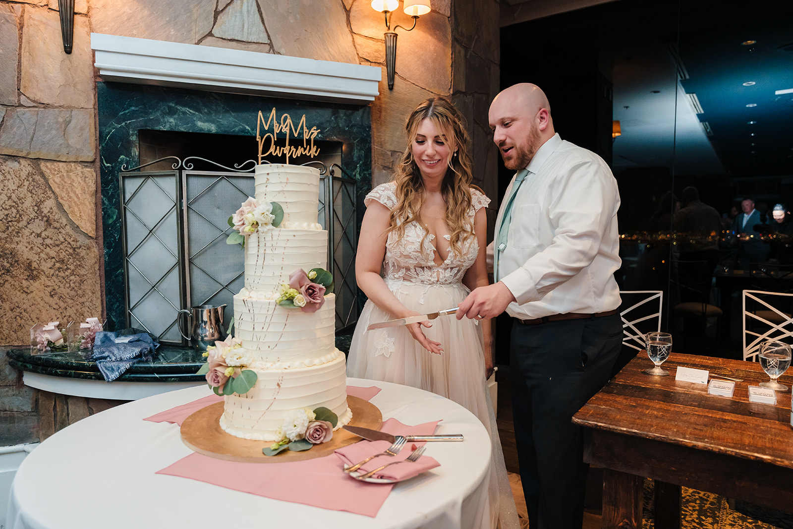 Newlywed cutting their wedding cake during the reception at revere golf club in Las Vegas