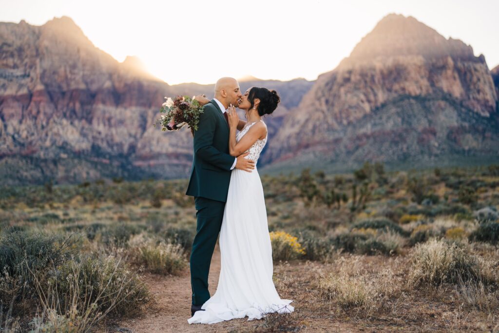 Couple sharing a passionate kiss during their Elopement at Red Rock Canyon in Las Vegas